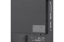 100QNED84BU TV back panel with ports and labels, including HDMI, USB, and optical audio out, with caution and warning information, Back View
