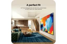 65QNED84BUA LG QNED TV with slim minimal bezel design wall mounted in modern living room with colorful abstract art display